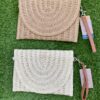 Cartera de mano de rafia